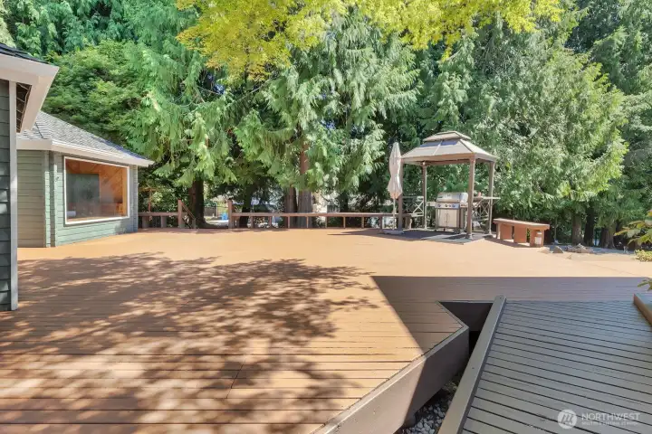 There is an expansive entertainment deck that features gas BBQ, gazebo, 12-person free-standing sauna & an outside 3/4 bathroom.