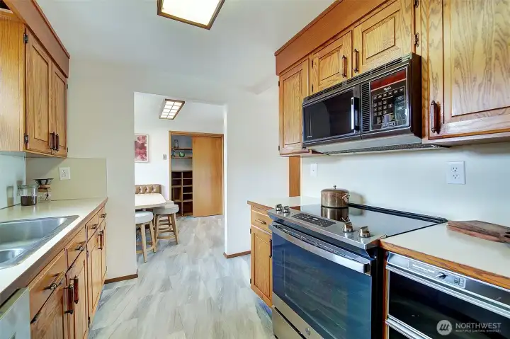 Lots of cabinet space and a nice connection to a cool retro dining nook