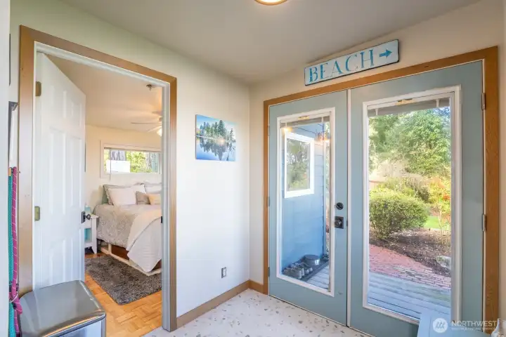 Secondary bedroom separated from main suite for privacy.