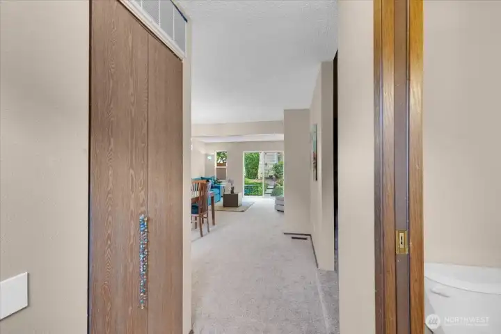 Entry with powder room to the right