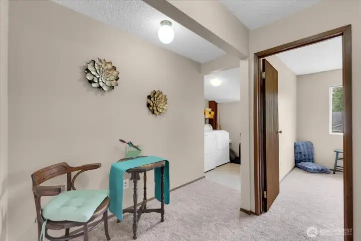 hallway on 2nd level with an arera for reading or a work-at-home set up