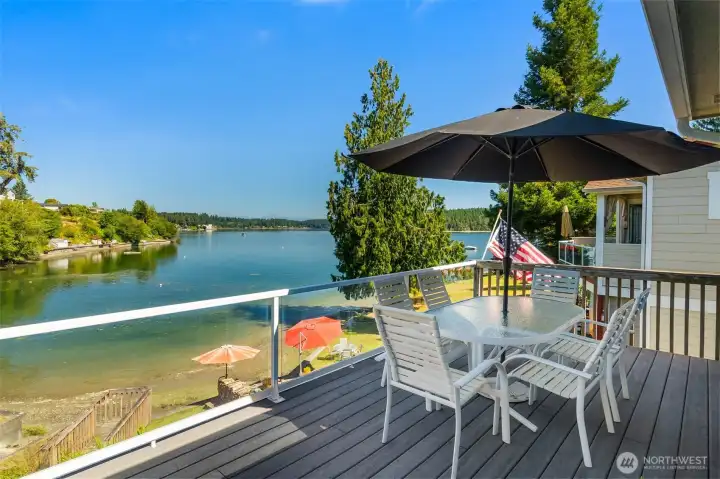 Enjoy this easy care composite deck with glass railing for more unobstructed views