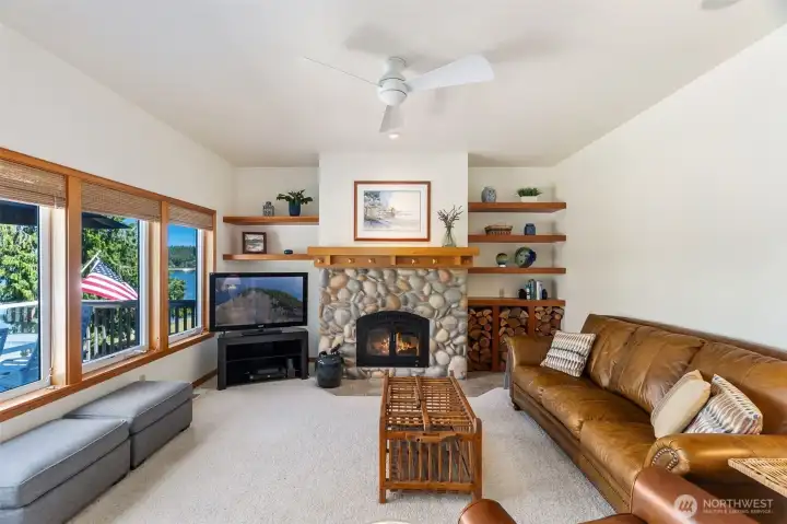 Cozy wood burning fireplace with built in display storage and storage for your firewood