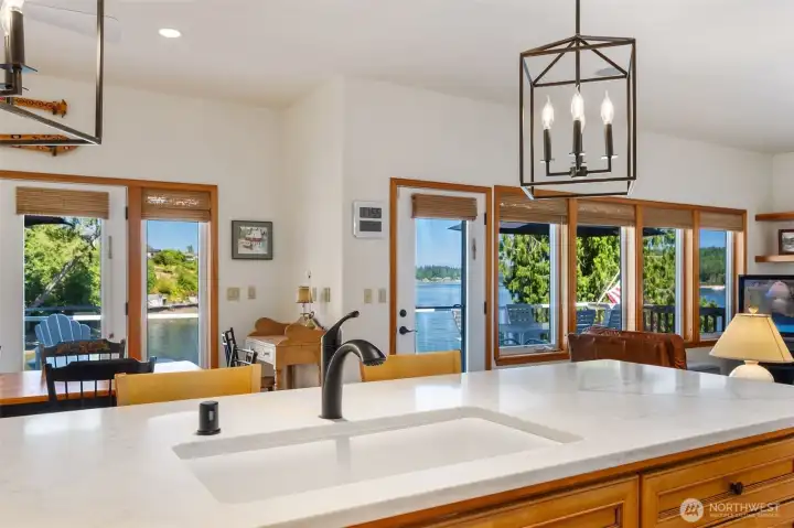 Updated counters and fixtures and a great, big undermount sink makes for easy clean up, with a view!