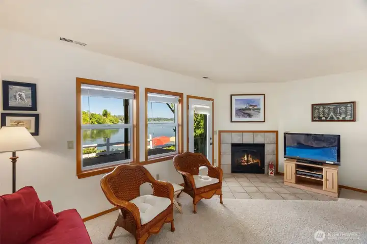 Headed downstairs, this bonus room with gas fireplace is a cozy retreat that can also serve as a bunk bed to stack up your guests!