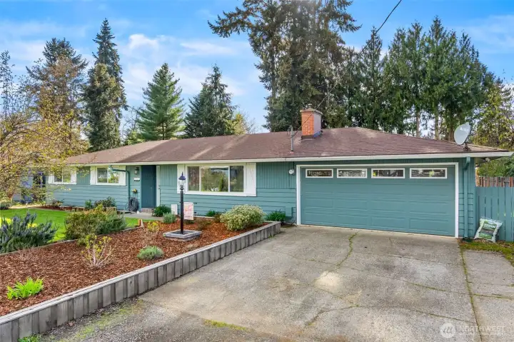 Spacious driveway with ample room for guest parking.