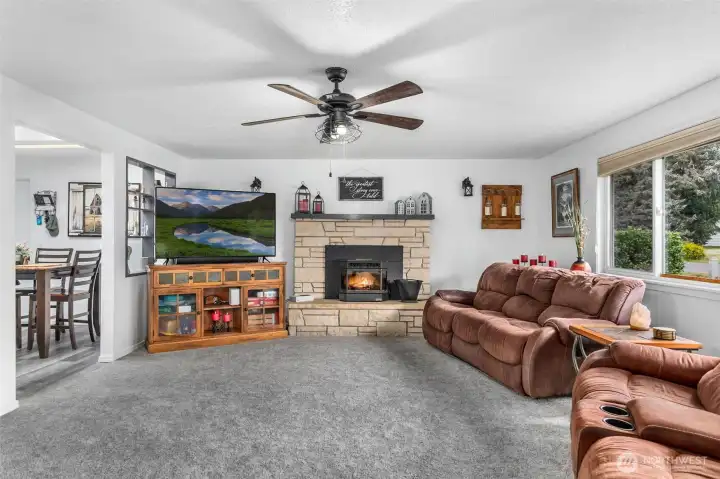 Bright and welcoming living room filled with natural light.