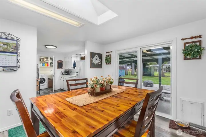 Open flow between kitchen and dining for easy entertaining.