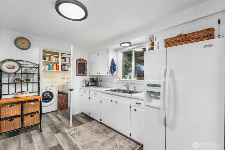 Bright kitchen enhanced by natural light.