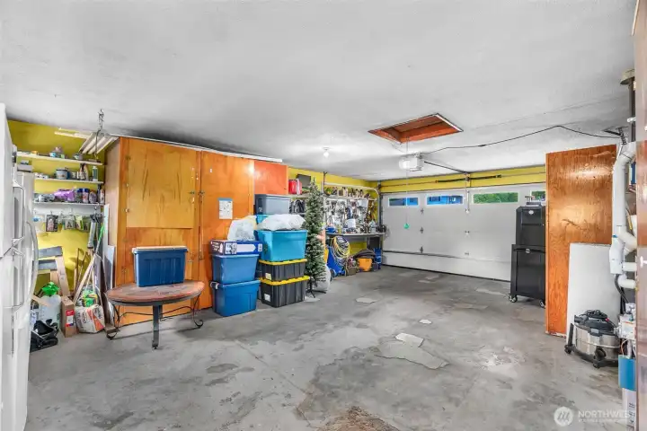 Spacious two-car garage with room for storage.
