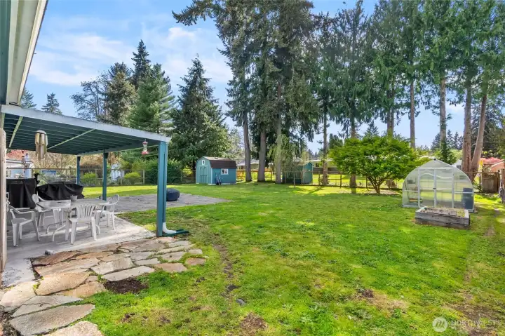 Fully fenced backyard offering privacy and security.