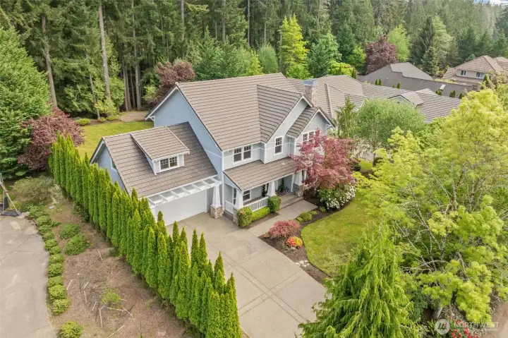Landscaped to make this home feel like it's very own private park!