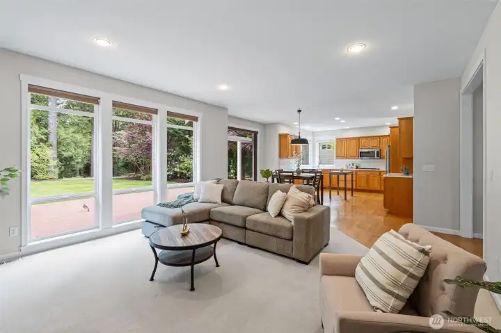 Large Picture Windows and a Sliding door to view the very private backyard
