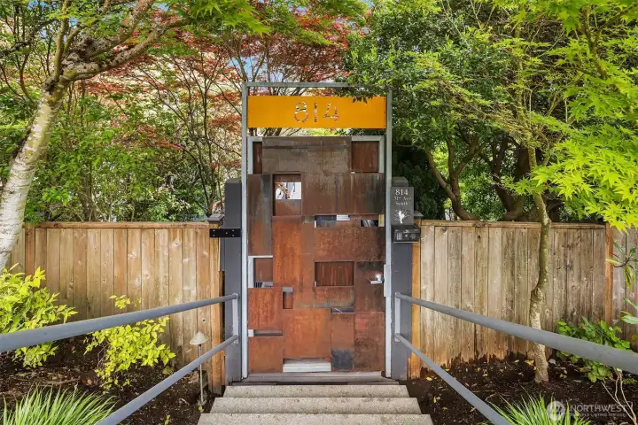 Discreet locking gate with a security system.