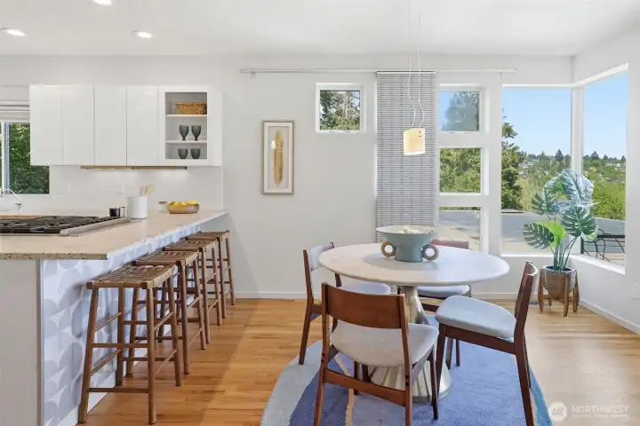 Banks of windows make the dining room feel so light and open.