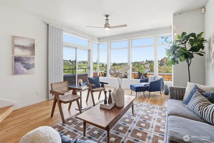 Spacious living room overlooking the city and the park and beyond.