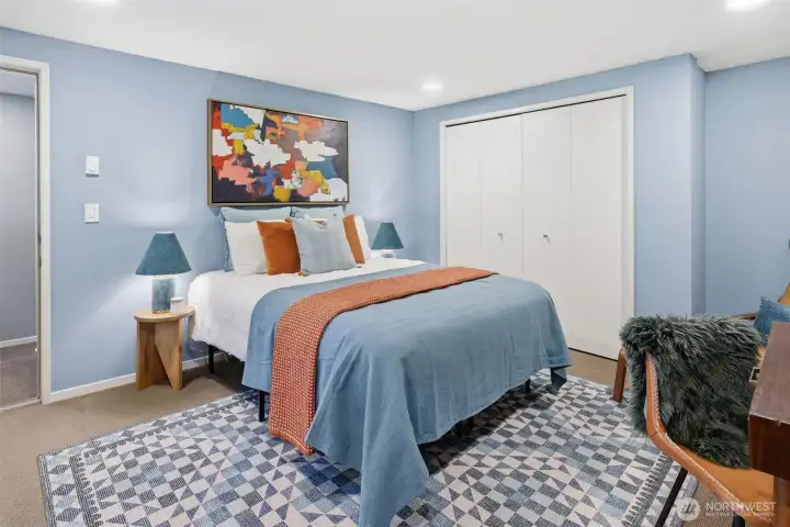 This is the first bedroom, spacious, private and colorful.