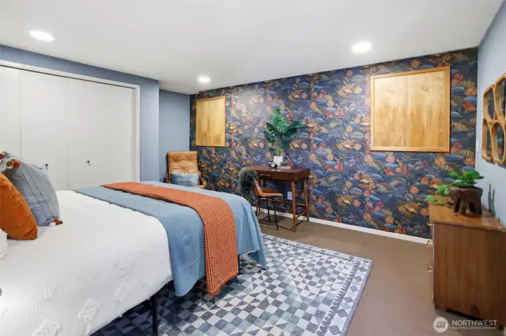 Stylish wallpaper and a huge storage space behind this wall.