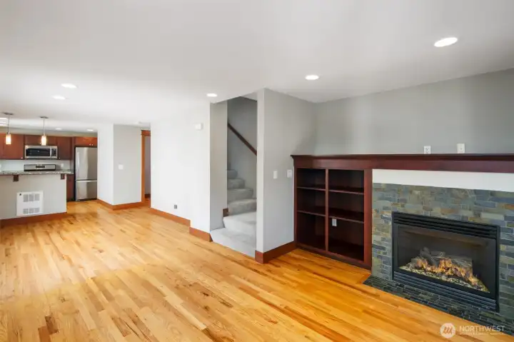 Dining and living room areas with gas fireplace