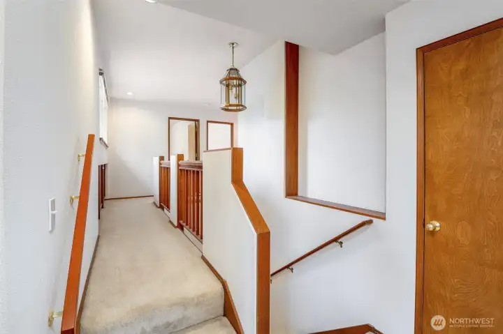 Head upstairs to 2 separate wings of the house