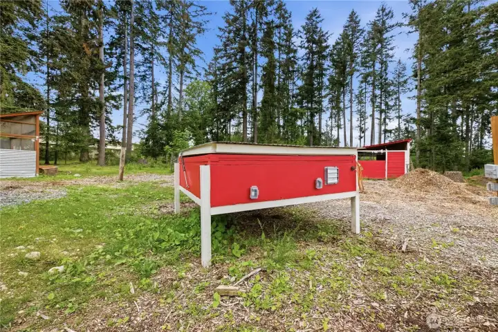 Chicken brooder for over 100 chicks, with plug ins for heat and ventilation.