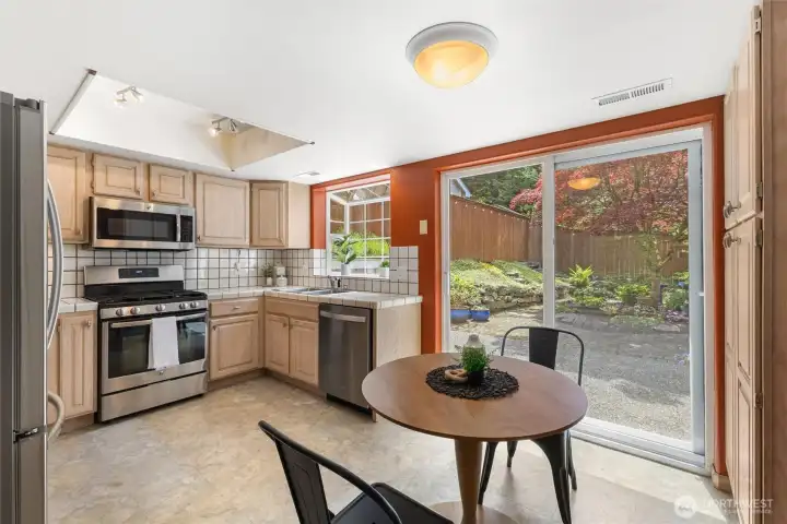 Beautiful Appliance Package Includes Gas Cooking, Abundant Daylight and Easy Patio Access
