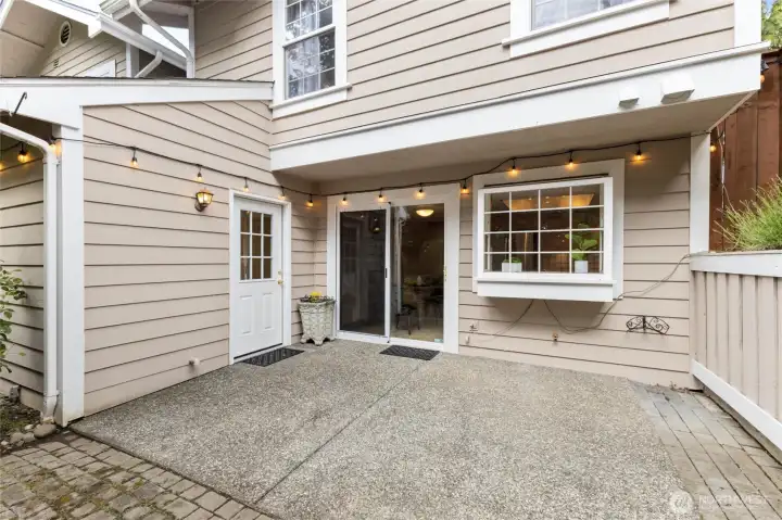 Garage to Yard Access, Just Enough Patio Area To Relax -Grab Your Lemonade