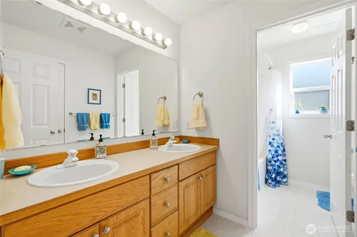 Beautifully arranged 2nd floor main bathroom has a 2 sink vanity and separate tub & toilet room. Beautifully arranged 2nd floor main bathroom has a 2 sink vanity and separate tub & toilet room.