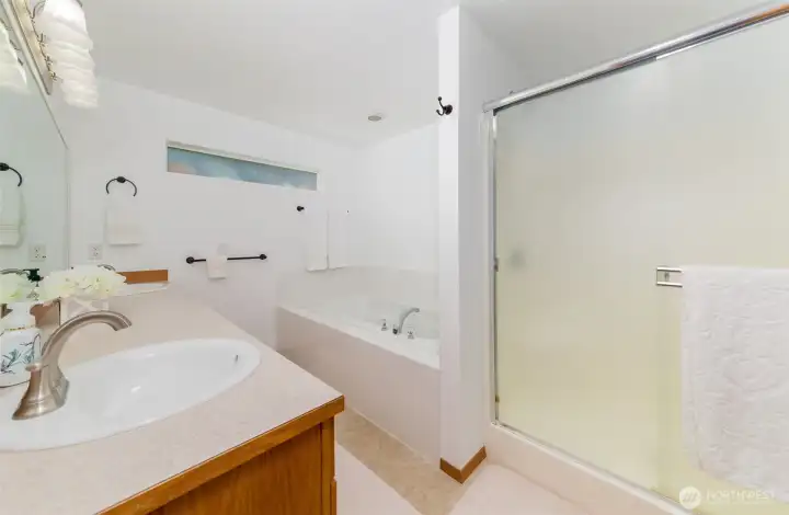 Primary Bath off Main Bedroom.  Walk-in shower and huge soaking tub.