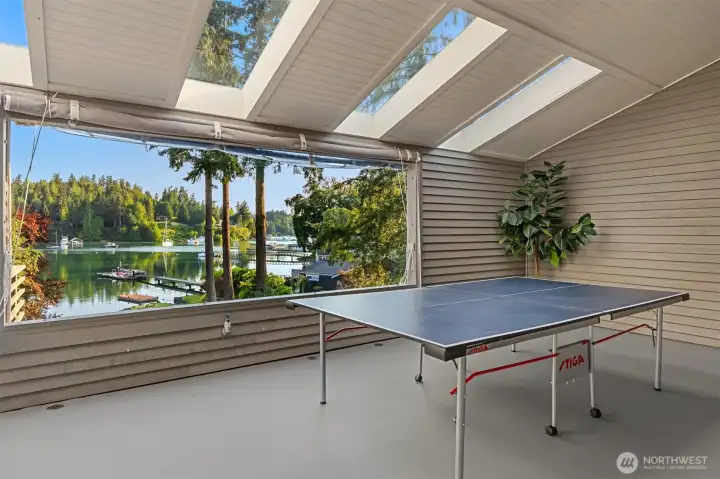 THIS is so cool! Massive covered area with skylights looking at the view!