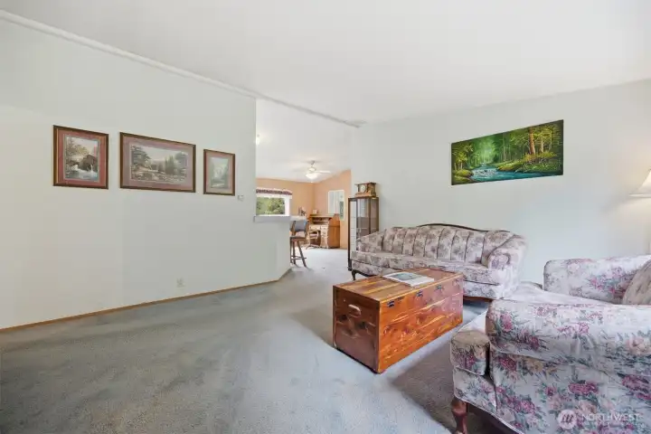 Looking toward the kitchen and dining room from the spacious living room.