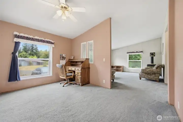 The dining room and family room are both spacious with vaulted ceilings.