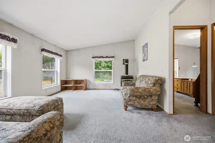 There is a freestanding stove in the family room for those chilly winter days!