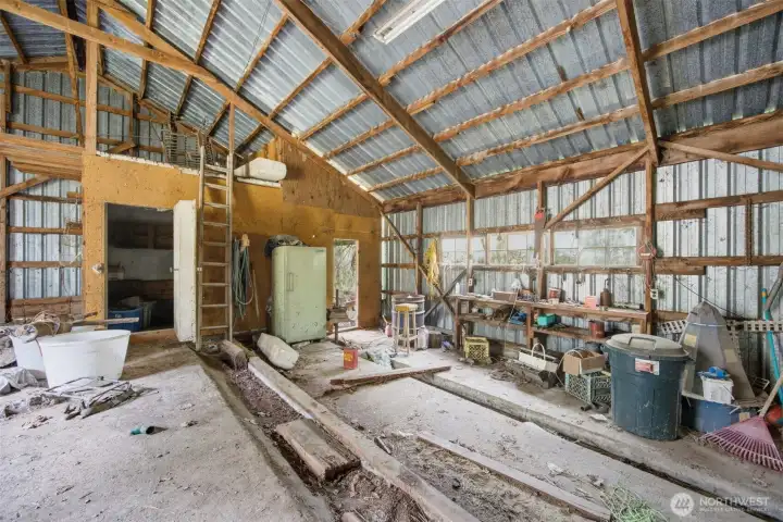 Another view of the barn with the metal roof.