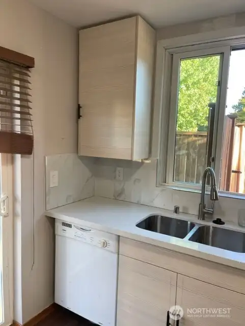 Kitchen - lower level Before tenant Kitchen - lower level Before tenant