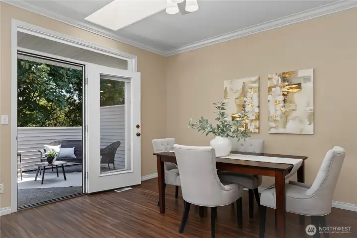 Formal dining area and kitchen peninsula seating.