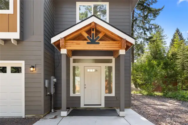 This is your chance to move right in and create your own space, unique to your tastes and likes.  Crisp white trim and warm charcoal exterior paint colors that are trending and set nicely amongst the evergreens.