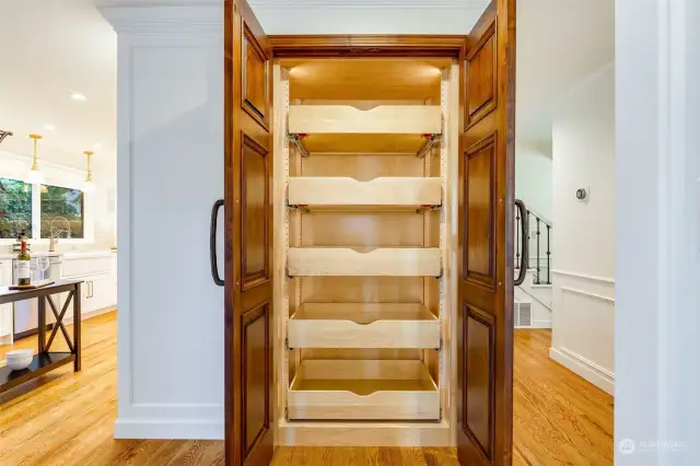 Custom built in pantry with roll out drawers