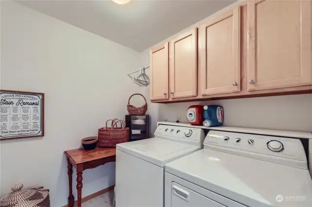 Laundry with cabinets to keep you organzed