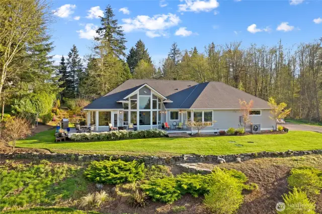 Views abound from this  beautiful hilltop home!