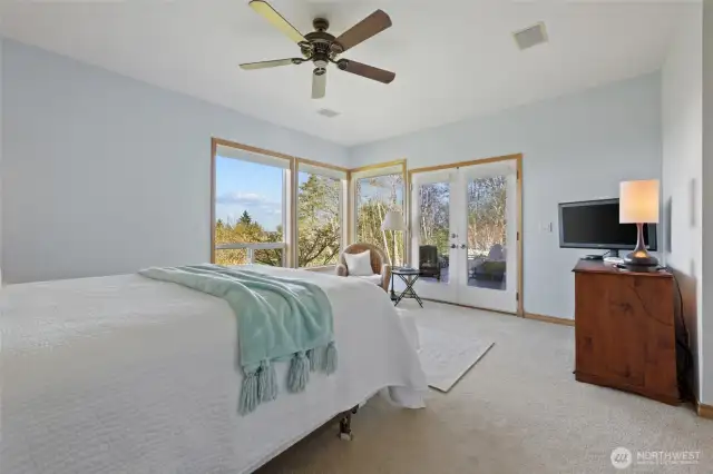 Primary has French doors that lead out to the deck