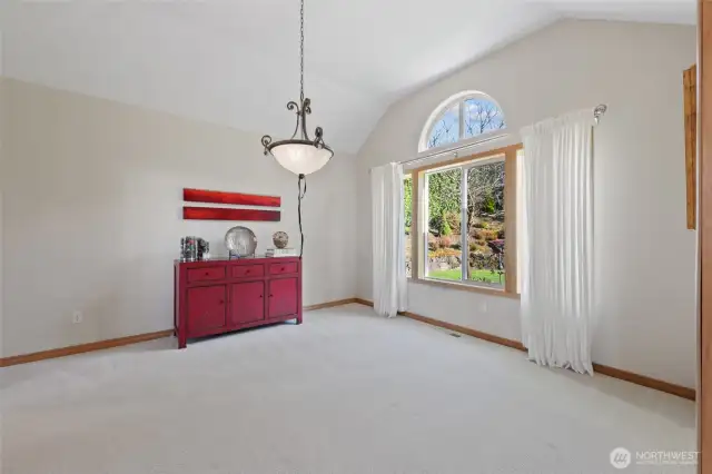 Dining Room with vaulted ceilings.