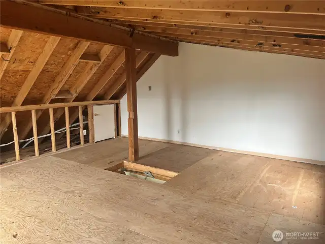 Upper level attic area; possible area for future expansion