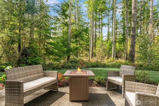 Exceptional outdoor spaces and greenbelt offing privacy.