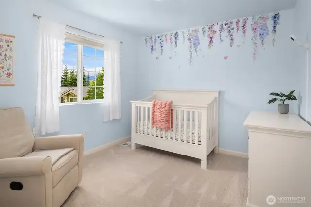 Spacious bedroom on upper level.
