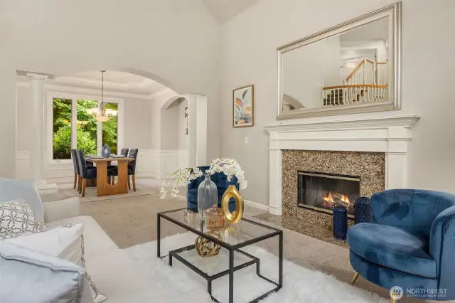 Formal living with gas fireplace.