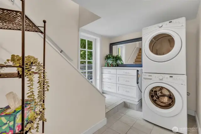 Head to the basement where the fun spaces await. Easy backyard access to the deck from here.