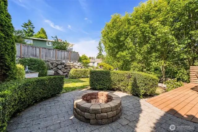 The backyard oasis with firepit