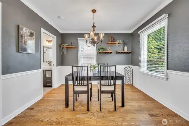 Shelving and coat closet with attic access in the dining room