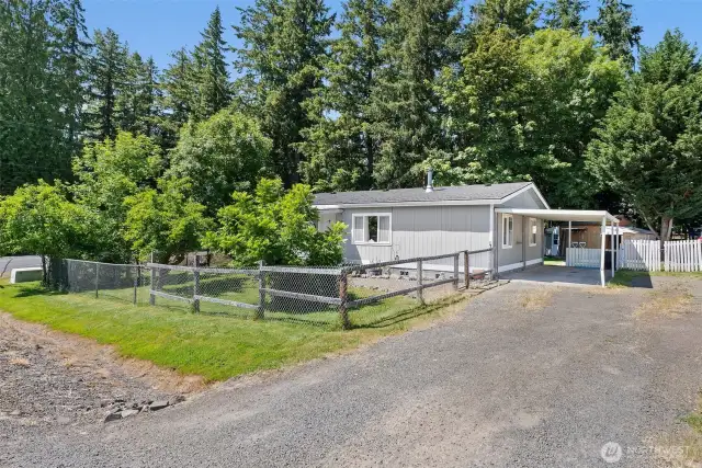 Convenient Carport Parking and Space for Your RV or Travel Trailer!